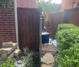 Catch basin dropped in beside the house to pick up water before it reaches the slab